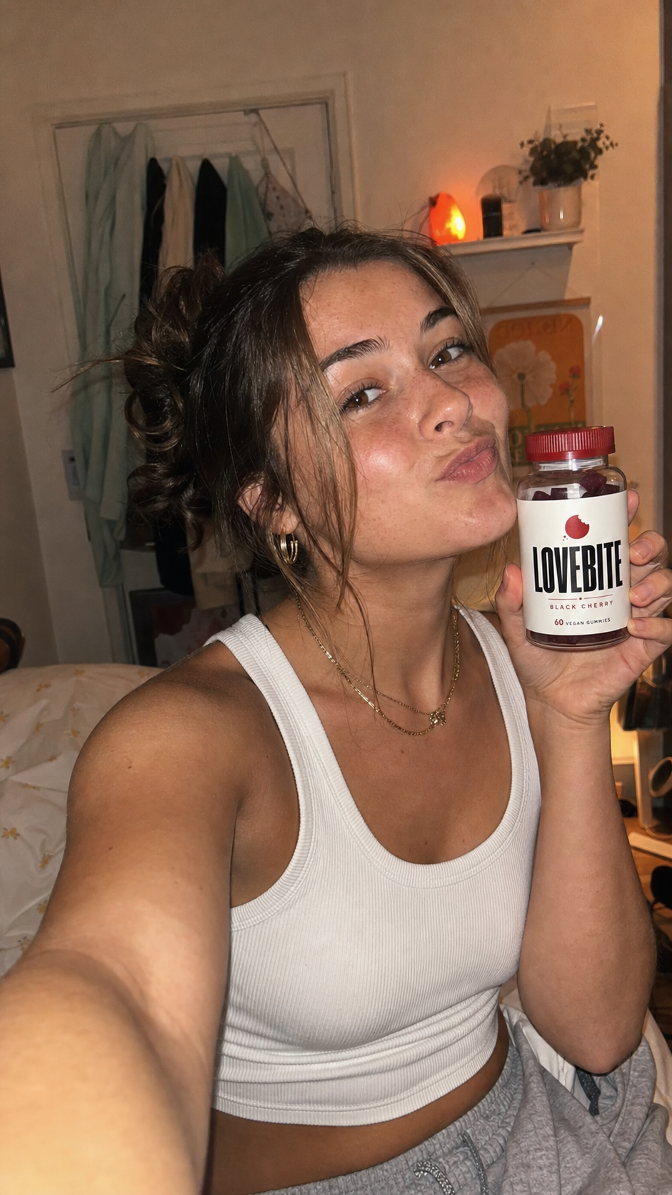 Lovebite customer holding a bottle